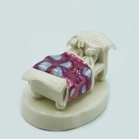 Woman in Bed with Cat