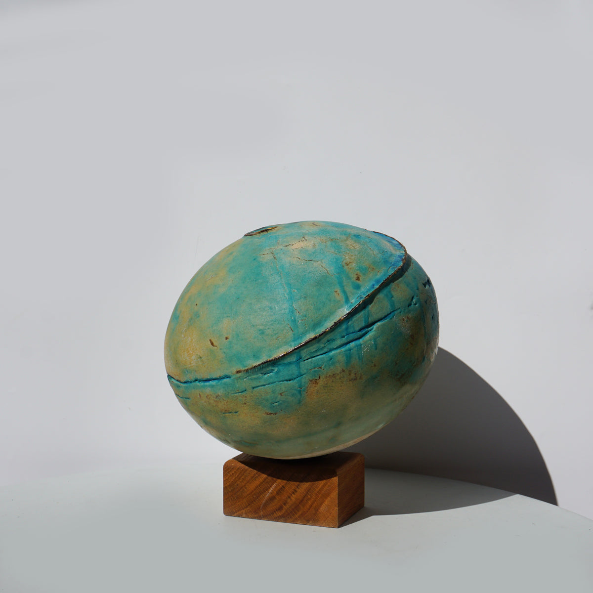Blue Earth Globe on Oak