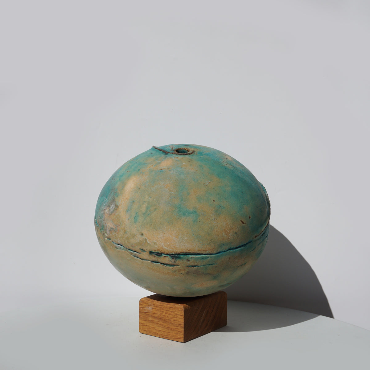 Blue Earth Globe on Oak