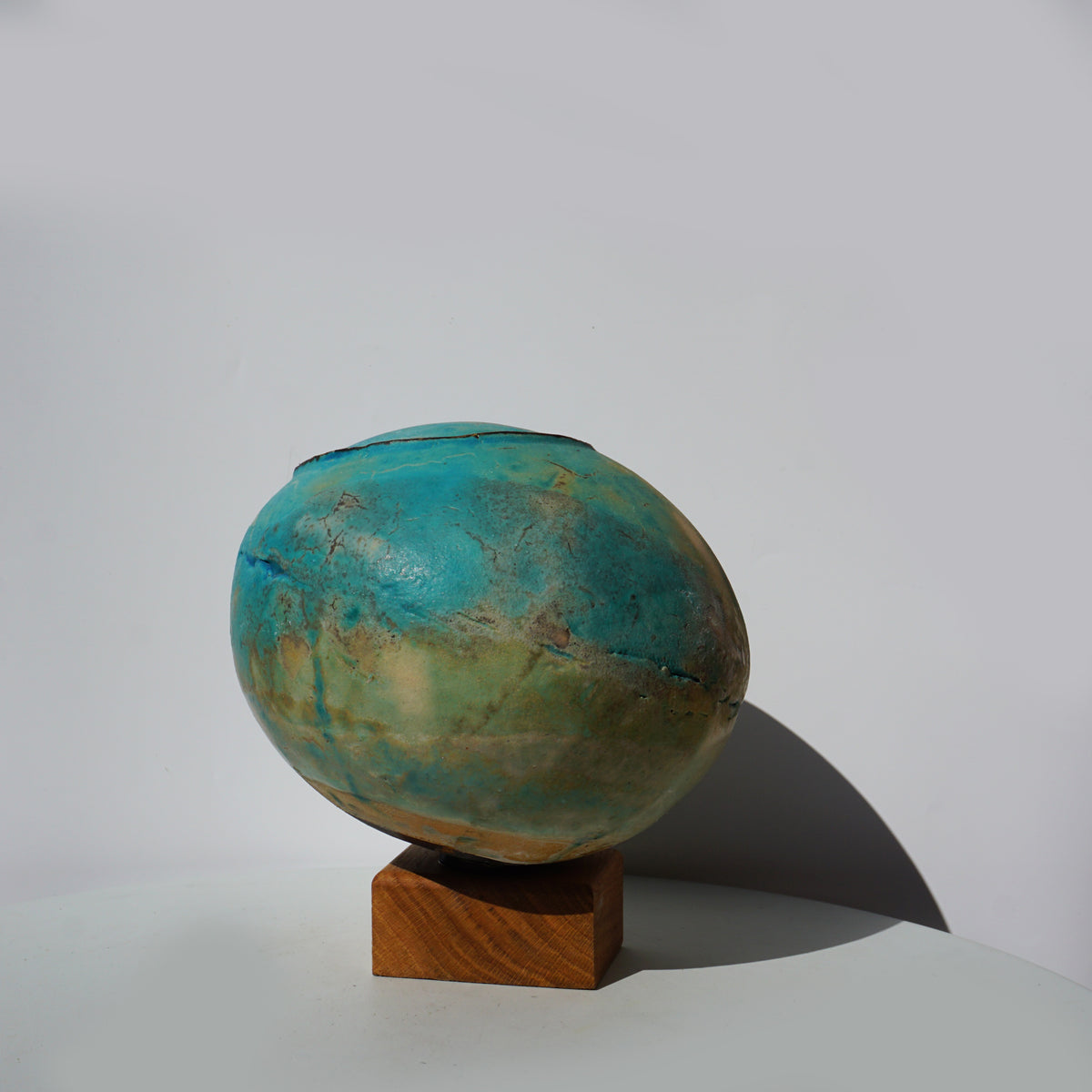 Blue Earth Globe on Oak