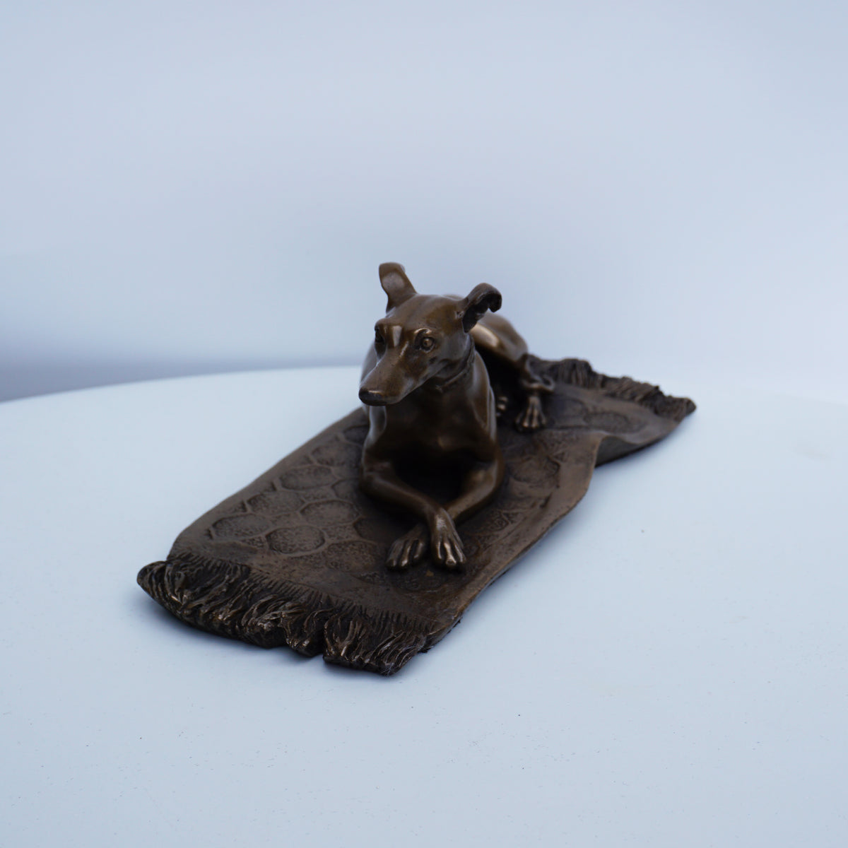 Greyhound on Rug