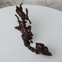Three Hares Running