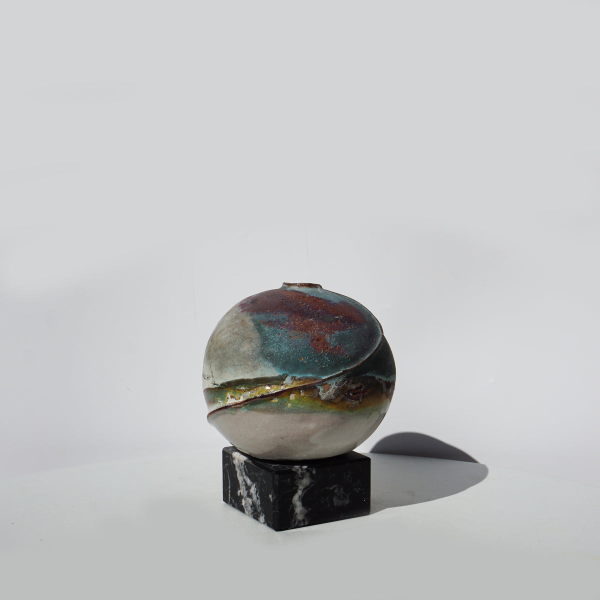 Of Fire and Metal Bowl on Marble Base